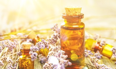 Sticker - Pile of lavender flowers and a dropper bottle with lavender essence