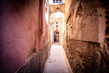 Fototapeta Uliczki - Colorful ancient old and narrow street in medina of Marrakech, Morocco, Africa