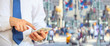 © Rawf8 - Businessman holding a smartphone