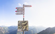 © Tandem Stock - Walmendingerhorn, Kleinwalsertal, Austria: A guidepost close to the top of the Walmendingerhorn with the Alps in the background.