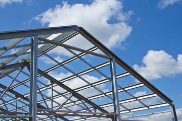 The structure of the building. Steel construction on the sky background. Electroplate steel metal. Zinc metal coating to protect against corrosion.