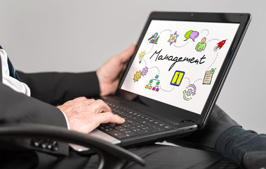 Management concept on a laptop