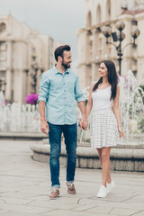 Poster - Fulll length body size view photo positive cheerful people millennial free time voyage weekend tourist visitor buildings fountain content rejoice fun denim jeans shirt blue dress sneakers bearded