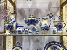 Blue Porcelain Crockery For Sale. Selection Of Plates, Bowls And Porcelain For Sale In The Shop. Blue Porcelain Utensils With Plates And Cups And Bowls On Display At Street Market.