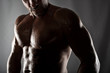 © alphaspirit - Muscular of a body building trainer man