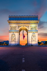 Wall Mural - Arc de Triomphe de Paris at night in Paris, France.