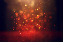 Abstract Red Glitter Lights Background. Defocused.