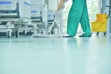 Cleaning Service Concept. Cleaners Employee Removing Dirt With Equipment In Office People Clean Flooring And Clean With Lint-free Cloth Towels Or Clean Hospitals In Asia