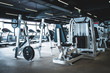 © EwaStudio - Modern light gym. Sports equipment in gym