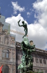 Wall Mural - Monument of Silvius Brabo, legendary soldier, throwing the hand of the Antigoon, in Antwerp, old city from Belgium