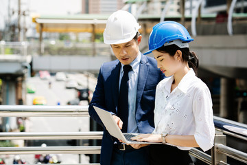 Quality engineers or construction teamwork. Safety concern for engineering or building work site or plant. Wearing helmet and protective equipment can safe workers life in industrial work or plant.