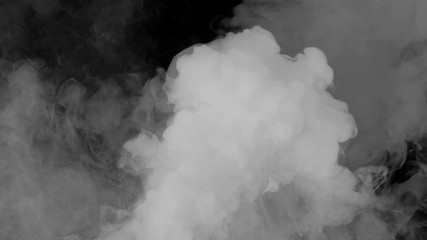 Abstract smoke steam moves on a black background . The concept of aromatherapy