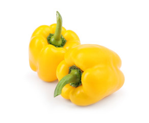 Ripe yellow bell peppers isolated on white