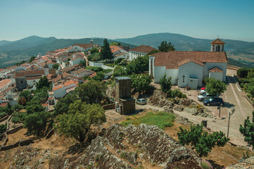 Old houses and church on top of ridge with wall in Marvao