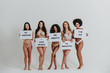 © oneinchpunch - Group of women with different body and ethnicity posing together to show the woman power and strength. Curvy and skinny kind of female body concept