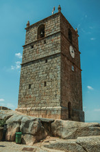 Stone Tower With Bell And Clock In Monsanto