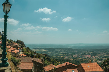 Wall Mural - Rooftops of old houses on hilly landscape in Monsanto