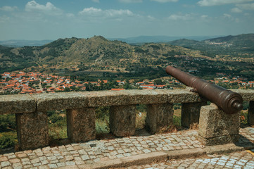 Wall Mural - Cannon overlooking hilly landscape in Monsanto