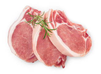 sliced raw pork meat with rosemary isolated on white background. Top view. Flat lay