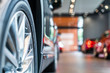 blur view of new modern car tire in showroom