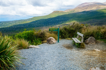 tongariro alpine crossing,bench and sign,volcano, new zealand