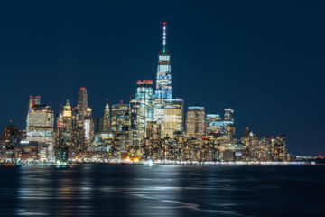 Fototapete - Scene of New york cityscape river side which location is lower manhattan which can see One world trade center at twilight time,USA,Taking from New Jersey,Architecture and building with tourist concept