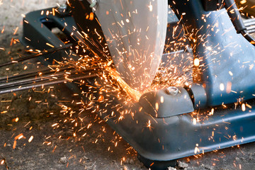 Technicians are using Fiber cutting platform tools to cut steel for construction.Industry in construction site concept