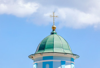 Christian cross on the church dome