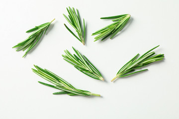 Poster - Flat lay composition with rosemary on white background, space for text