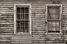 Old Clapboard House And Two Windows