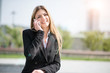 © Minerva Studio - Smiling business woman talking on the phone