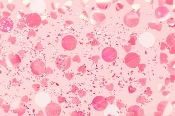 Glitter sparkles Confetti on pink pastel background. Festive holiday backdrop. Flat lay.