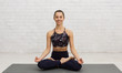 © Prostock-studio - Yoga Concept. Relaxed Sportswoman Meditating In Lotus Pose