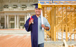 © Andy Dean - Split Screen Male Hispanic Graduate In Cap and Gown to Engineer in Hard Hat Concept