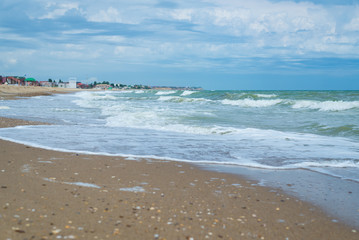 Wall Mural - Sea surf on the beach. Waves coming ashore.