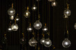 © Golden_hind - Lighting bulbs on dark background texture background