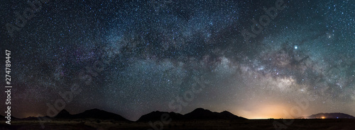Leinwand Poster  Pano of the Milky way in Arizona