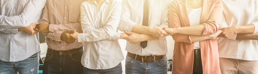 Fototapete - Unity and teamwork concept.