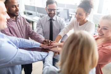 Fototapete - Stack of hands. Unity and teamwork concept.