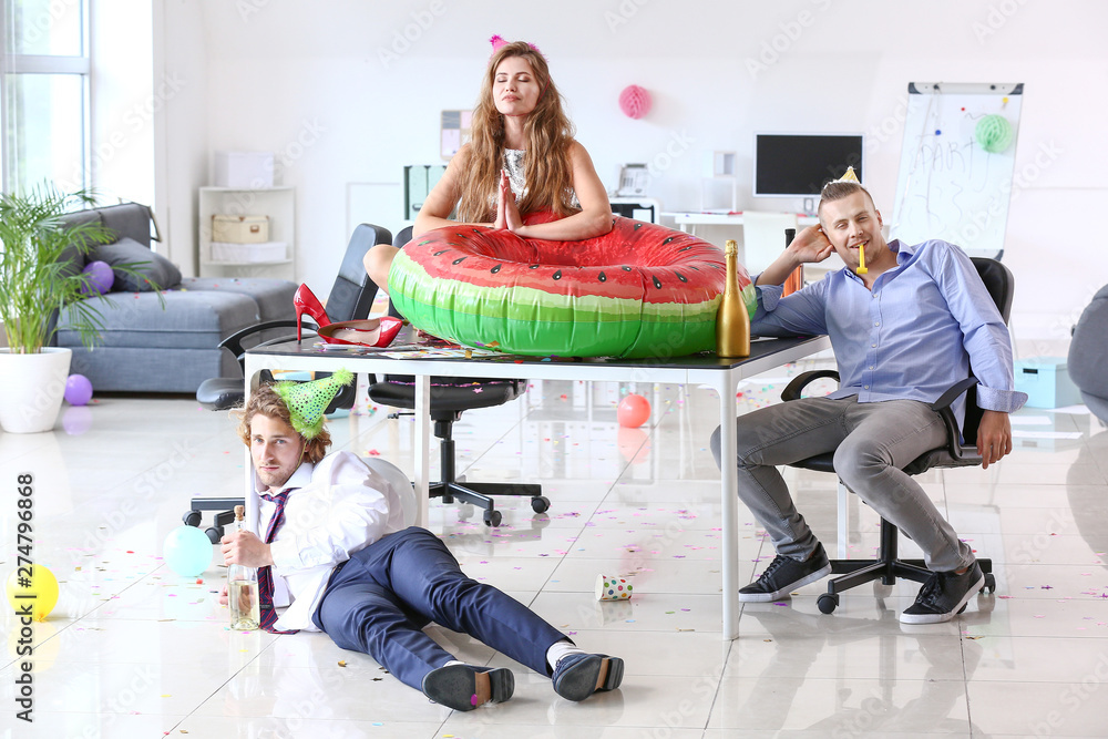 Drunk people at party in office