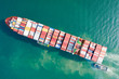 © Sunday Stock - Aerial view and top view. Container ship in pier with crane bridge carries out export  and import business in the open sea. Logistics and transportation