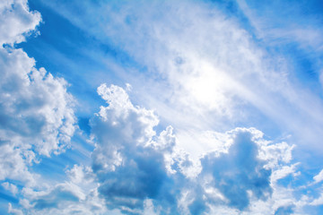 Blue sky background and fluffy white cloud in sunny day