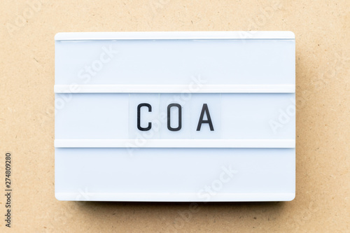 White Lightbox With Word Coa Abbreviation Of Certificate Of Analysis Certificate Of Authenticity Cause Of Action On Wood Background Buy This Stock Photo And Explore Similar Images At Adobe Stock