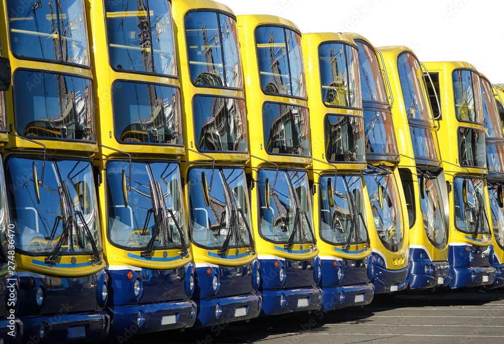 Line Up of Double Decker Buses Stock Photo | Adobe Stock