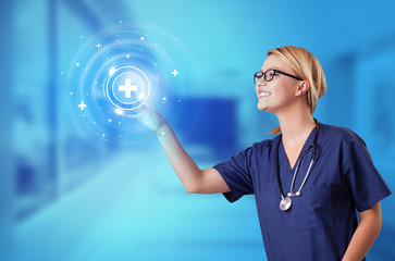 Wall Mural - Doctor touching blue screen with call center concept
