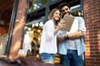 © NDABCREATIVITY - Beautiful couple in love dating outdoors and smiling