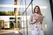 © NDABCREATIVITY - Beautiful brunette girl using tablet for work, freelance, blogging, studying, shopping