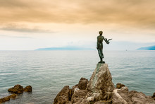 Maiden With The Seagull, Sculpture On Rock In The Adriatic Sea, Opatija, Croatia