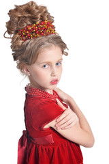 Portrait of cute girl in red dress posing isolated