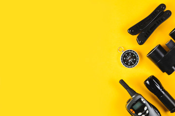 Wall Mural - A set of equipment for a hike or travel on a yellow background